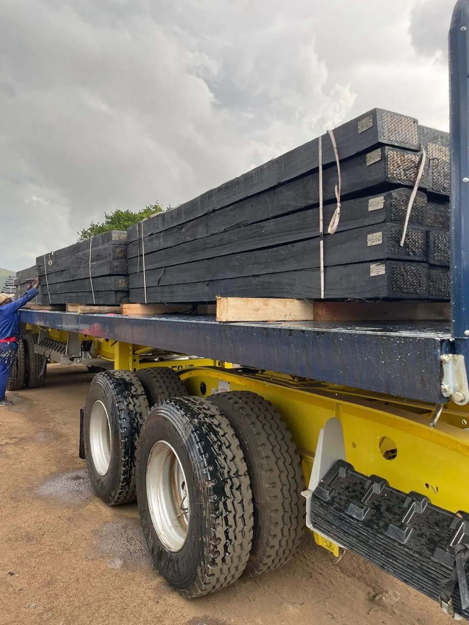 Treated hardwood railway sleepers loaded on a truck