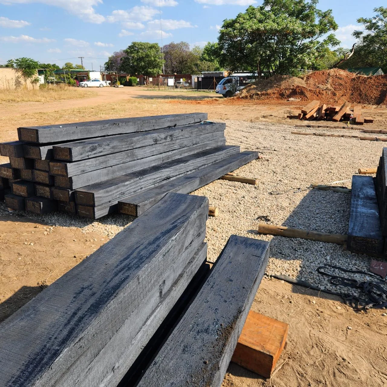 Treated hardwood sleepers treatment yard overview